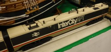 A large selection of various toys and models including model of an Intercity APT loco and carriages,