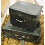 Two green leather suitcases marked Asprey of London