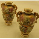A pair of Japanese Meiji period satsuma ware baluster vases,