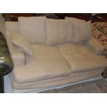 A modern upholstered two seat sofa