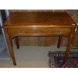 A walnut and feather banded single drawer side table in the Georgian manner,