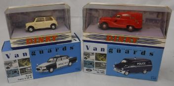 A collection of Lledo Vanguards model Police vehicles including Ford Transit Mk I van and boxed