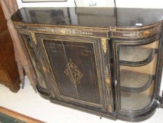 A Victorian ebonised and marquetry inlaid credenza