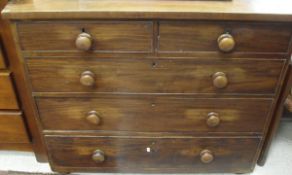 A Victorian mahogany chest of two short over three long graduated drawers
