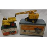 A Dinky Supertoys Dumper Truck 562, boxed and a Dinky Supertoys Coles Mobile Crane 571,