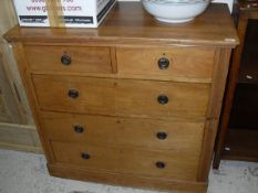 A Victorian satin walnut chest of two short over three long drawers