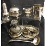 A silver three piece cruet and a quantity of various plated ware to include ice bucket , milk jug,