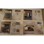 A box containing various modern first day covers and stamps,