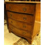 A 20th Century burr walnut veneered serpentine fronted chest of four drawers
