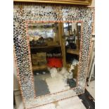 A mosaic mirror framed rectangular wall mirror with bevel edged plated by Debbie Sterling of
