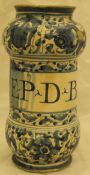 A late 17th / early 18th Century faience drug jar with all over blue and white scrolling floral