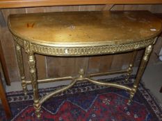 A gold painted demi-lune side table in the Louis XVI manner CONDITION REPORTS 113 x