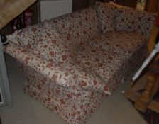 A modern upholstered Laura Ashley Knowle style sofa