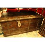 An Indian iron bound teak trunk with cellerette to interior and side wine rack CONDITION