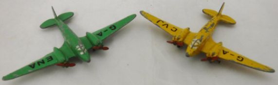 Two Dinky Airspeed Envoy model planes, one inscribed "G-A ENA",