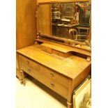 An early 20th Century oak wardrobe compactum with matching dressing chest and pot cupboard