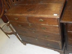 A circa 1800 oak chest of two short over three long drawers on bracket feet