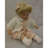 A 20th Century porcelain doll,