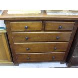 A modern oak chest of four long drawers and a modern pot cupboard