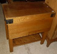 A modern "butcher's block" type table with side flap and drawer