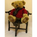 A Harrods "2005" 20th Anniversary bear on a Georgian style chinoiserie decorated corner chair,