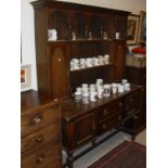 An oak dresser in the 18th Century style,