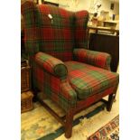 A modern tartan upholstered wing back scroll arm chair in the Georgian manner