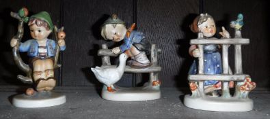 Three Goebel figurines,