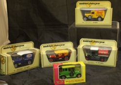 A collection of Corgi Classics model vehicles including AFS Line Layer Land Rover canvas back,
