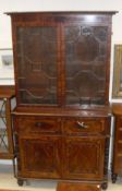 A late Regency mahogany secretaire bookcase cabinet in the Gillows manner,