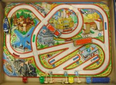 A 1950's Lemez (Hungarian) tin and lithographed town car game with wind-up vehicles and simple