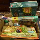 Three boxes containing various toys, games and puzzles including Flying Helicopter game,