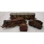 A collection of Hornby 0 gauge railwayana including Royal Scot 1-0-0 loco and tender in LMS livery,