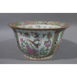 A Cantonese famille rose jardiniere, 19th century, decorated with panels of dignitaries on terraces,