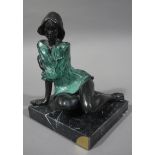 A contemporary bronze figure of a seated semi nude female on grey marble base with verdigris