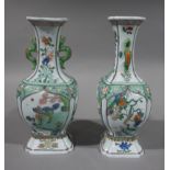 A pair of Samson Kangxi Style famille verte vases of shaped squared form with flared necks,