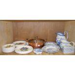 A brass and copper double handled pan, a pair of brass candlesticks, a Willow Pattern toilet jug,