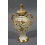 A Royal Worcester blush ivory vase and cover printed and decorated with coloured poppies on a