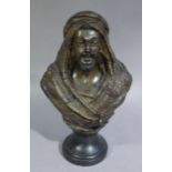 A LATE 19TH CENTURY CONTINENTAL EARTHENWARE BUST OF A MOOR, bearded and wearing head dress,