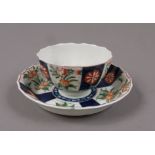 A FIRST PERIOD WORCESTER QUEENS PATTERN TEABOWL AND SAUCER, c.