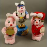 Three Duracell Bunny figures including, Drumming Bunny, Globetrotter Bunny and Christmas Bunny,