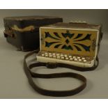 A Galotta two row diatronic model melodeon in brown pearloid, 22cm x 26cm long,