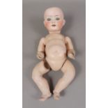 A Heubach Bisque porcelain headed doll, numbered 320.