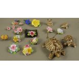 A collection of ceramic jewellery including brooches and ceramic tortoise set