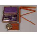 An early 20th century mahogany case brass, steel and bone drawing set,