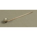 An Edward VII pearl and diamond cluster tie pin in 9ct gold,