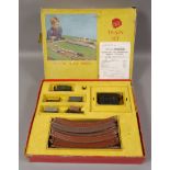 A Tri-ang TT gauge model electric train set, with tender, four wagons,