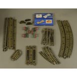 A collection of approximately 60 Hornby Dublo OO gauge 3 rail rack c.