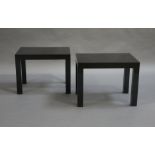 A pair of black finished side tables,