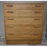 Gordon Russell walnut chest of five graduated drawers, bar handles, on plinth base,